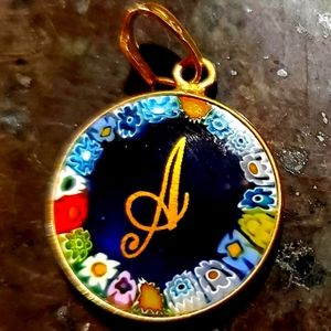 Morano A letter pendant glass. Gold and blue colors.